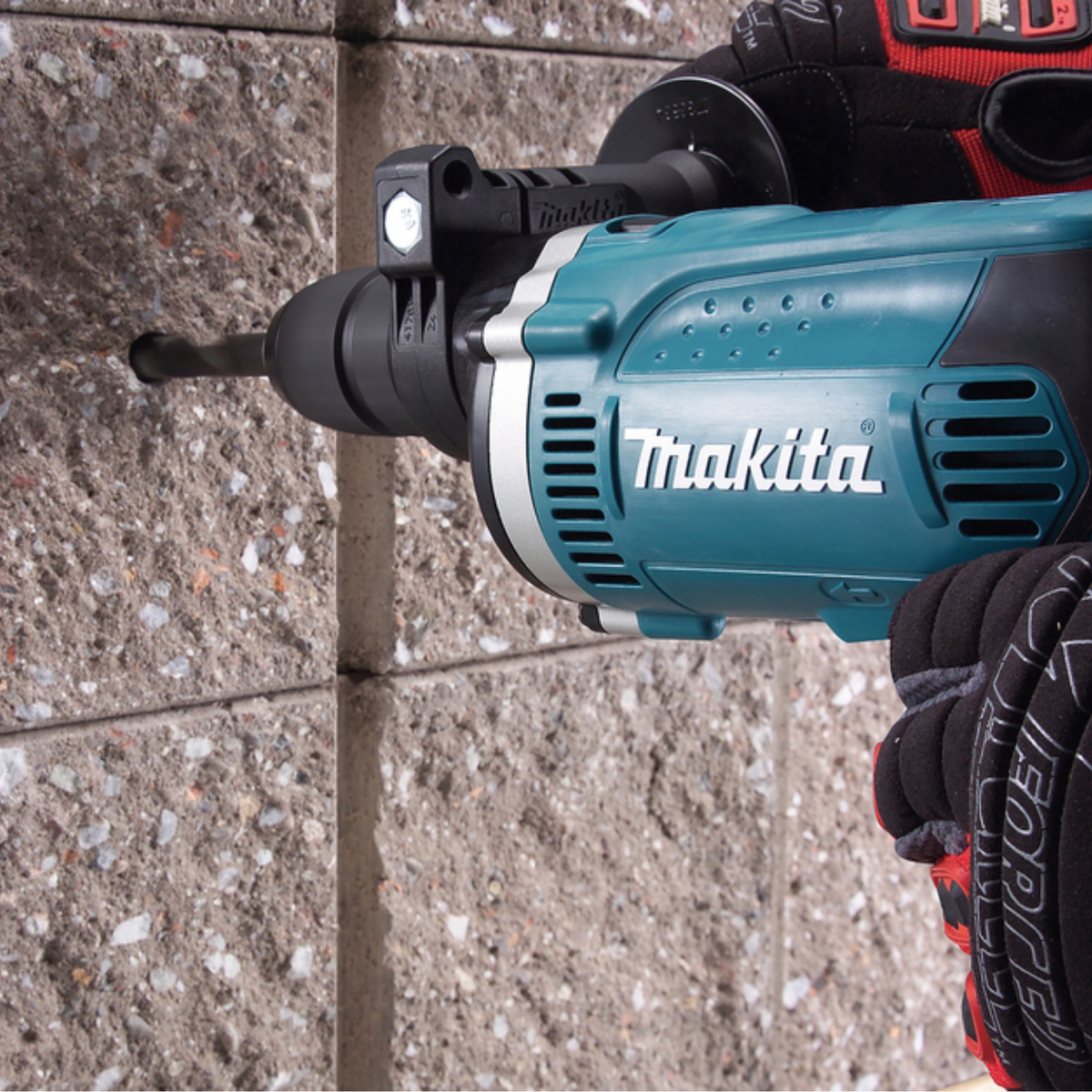 Trapano con percussione Makita  HP1631